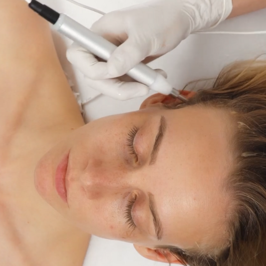 Microcurrent hair treatment to stimulate scalp and promote healthy hair growth at Modern Radiance Oregon spa.