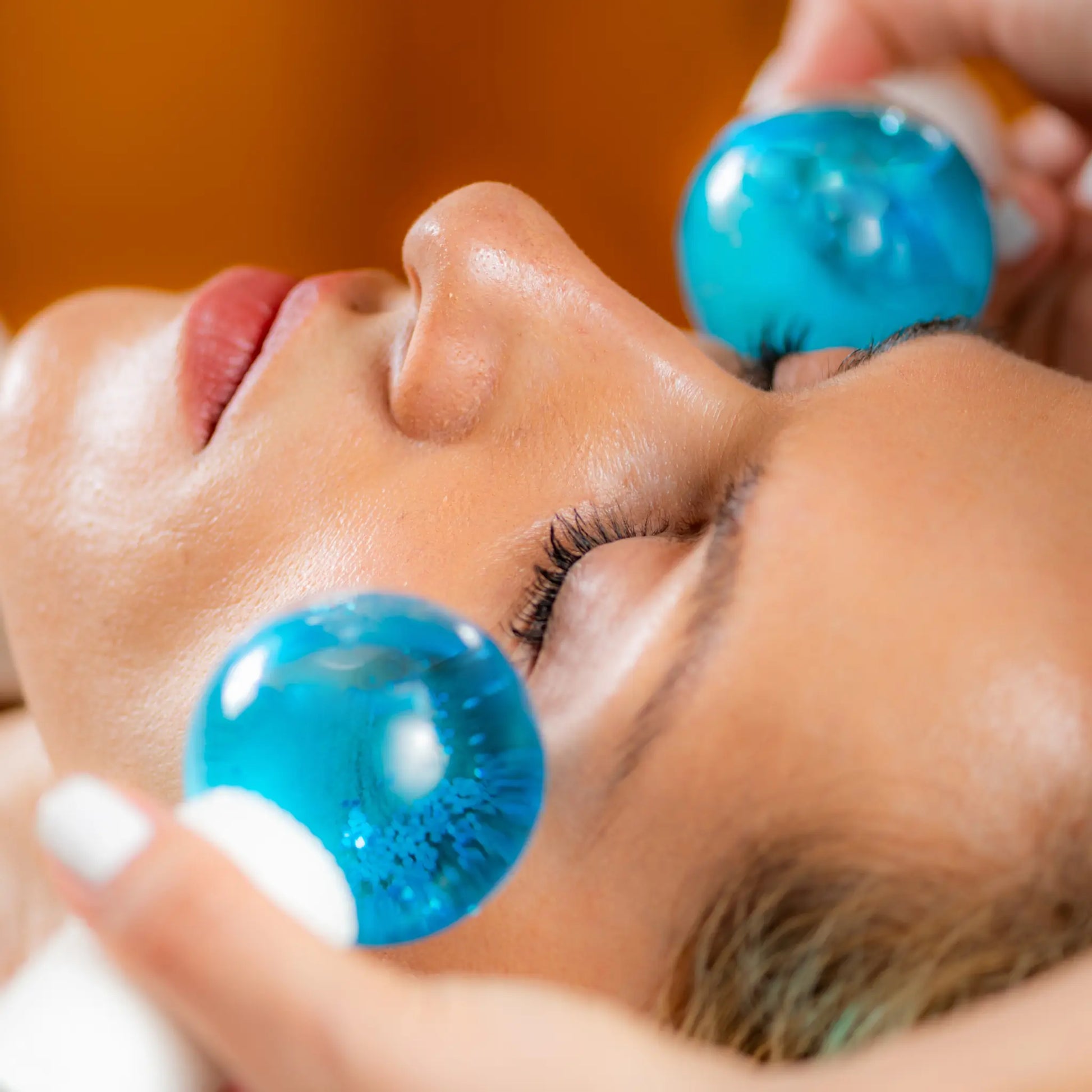 Cooling beauty globes facial treatment to reduce puffiness and refresh skin at Modern Radiance Oregon spa.